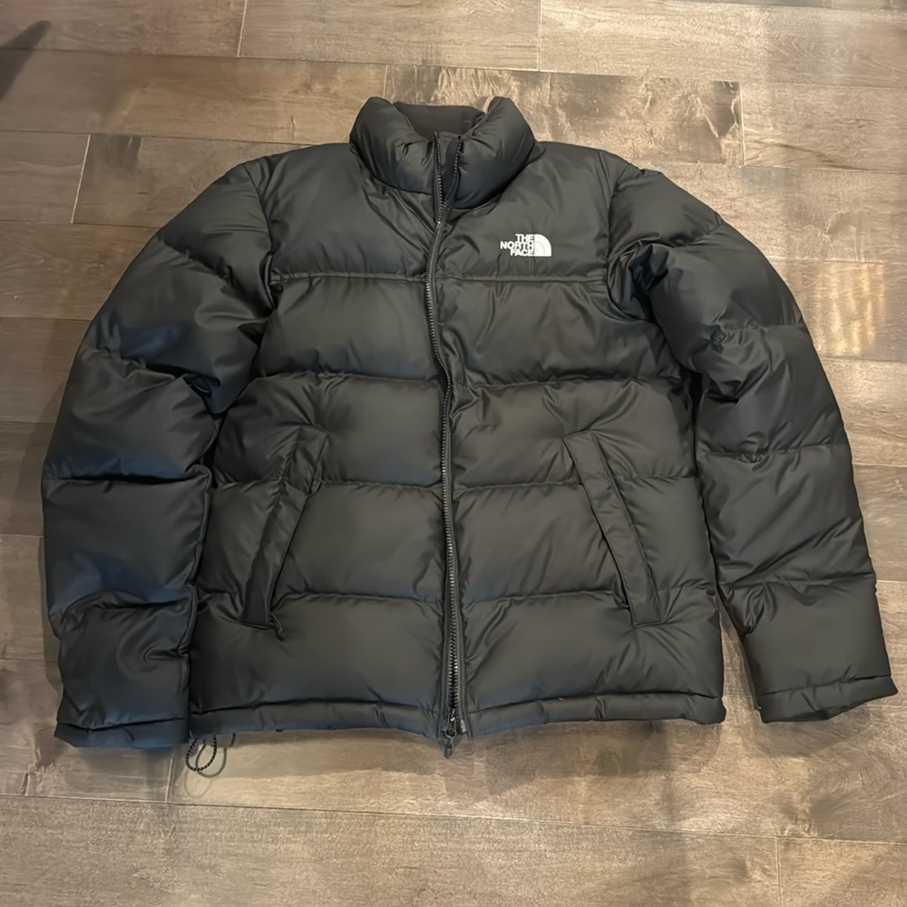 The North Face puffer jacket men’s size small excellent condition